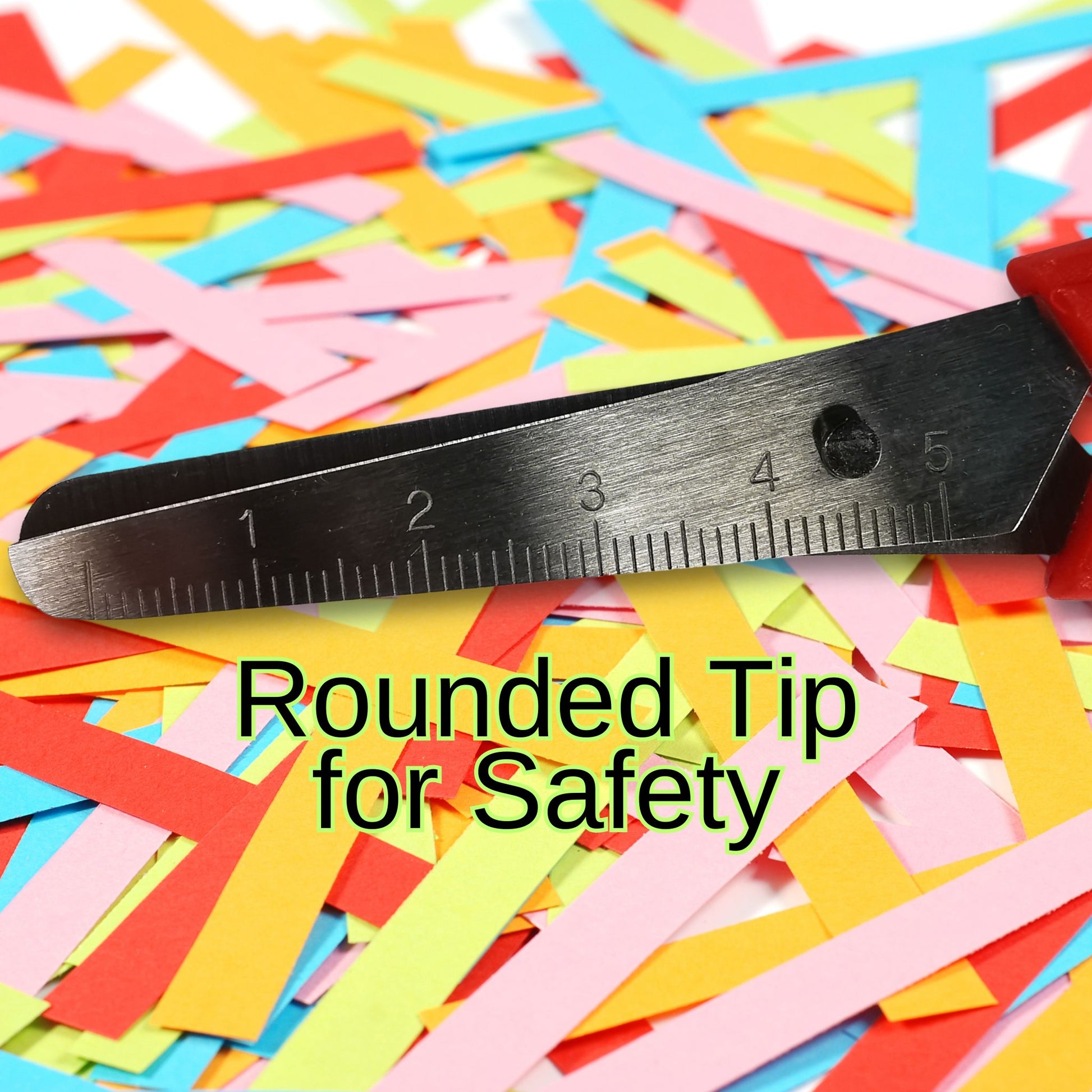 kids scisors blades with rounded tip on colorful confetti background