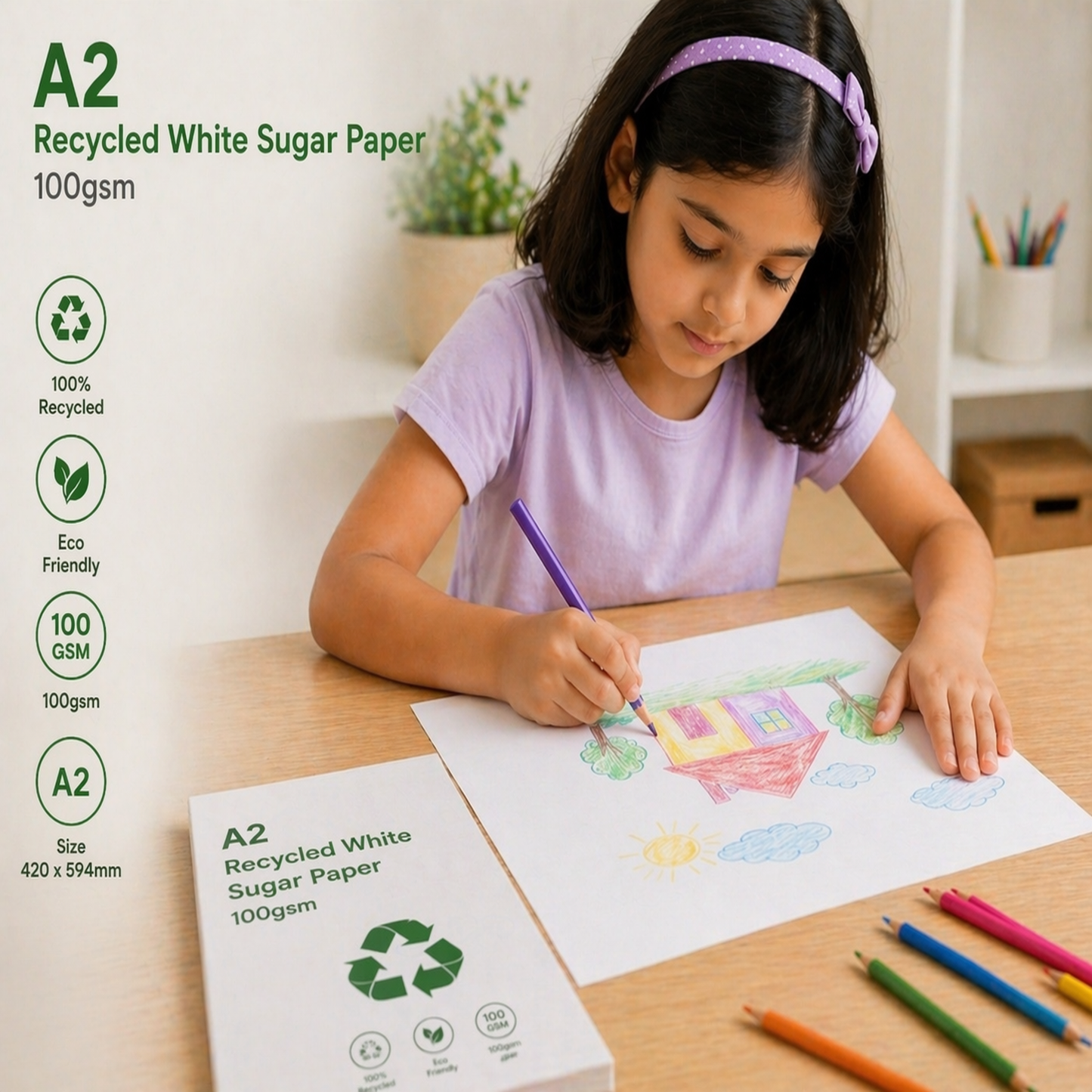 Child drawing with colored pencils on A2 recycled white sugar paper