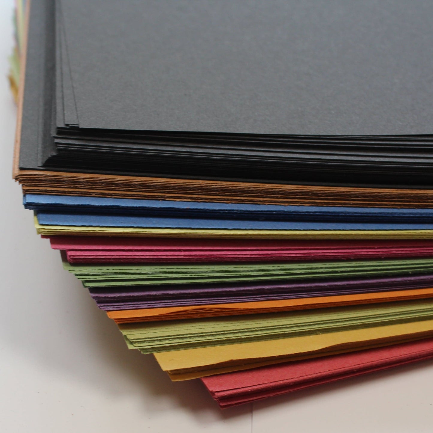Recycled bright and black sugar paper