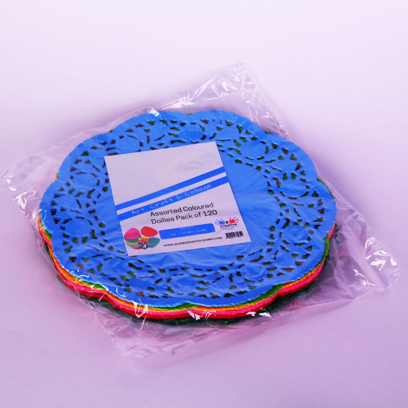 bright coloured paper doilies