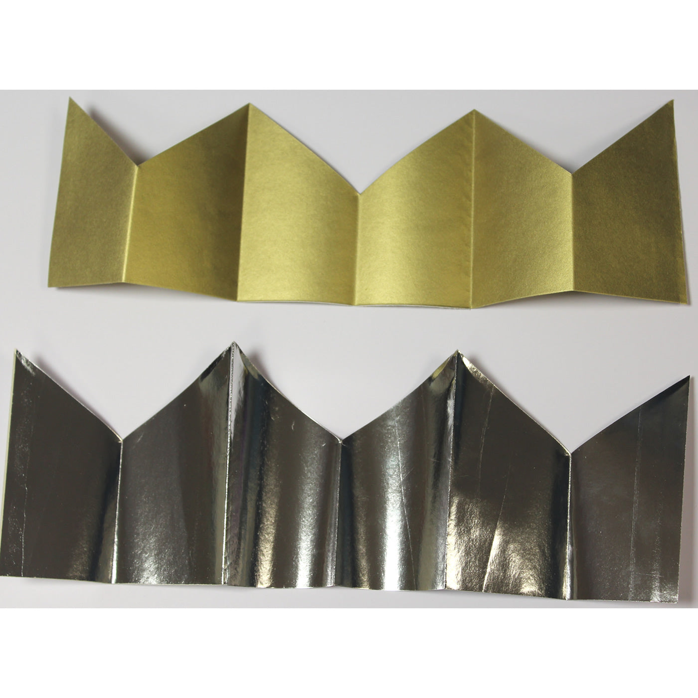 gold and silver cracker hats