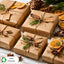 Brown paper-wrapped gifts with decorative elements on a wooden surface, featuring a '100% Recycled' label.