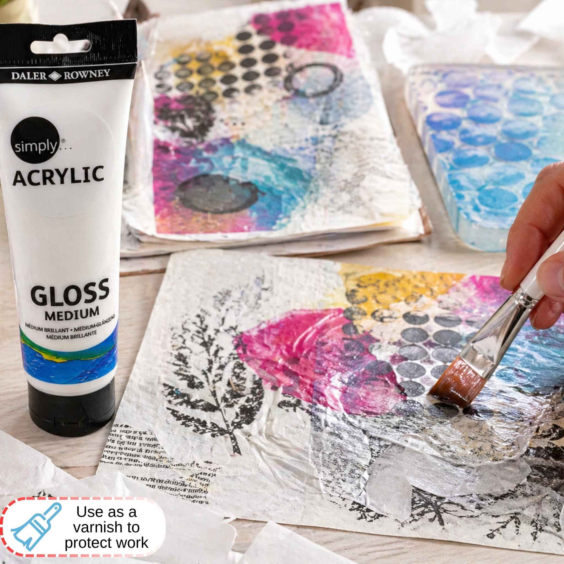 Daler Rowney acrylic gloss medium being applied to art via a brush
