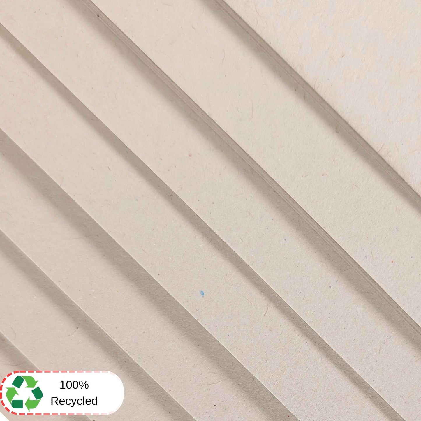 White textured sugar paper with a 100% recycled label