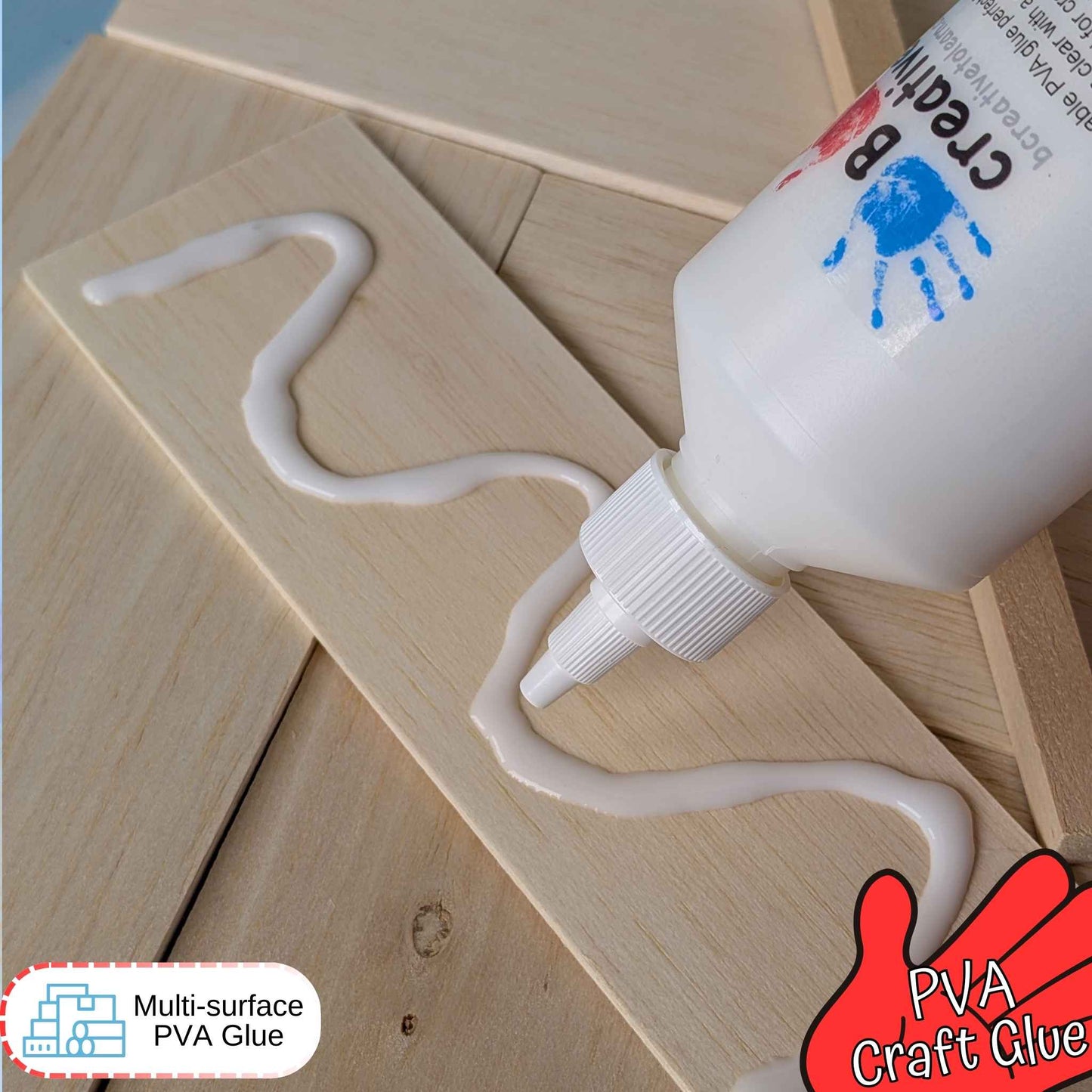 PVA craft glue being applied to wooden boards with a glue bottle labeled 'B. Creative'.