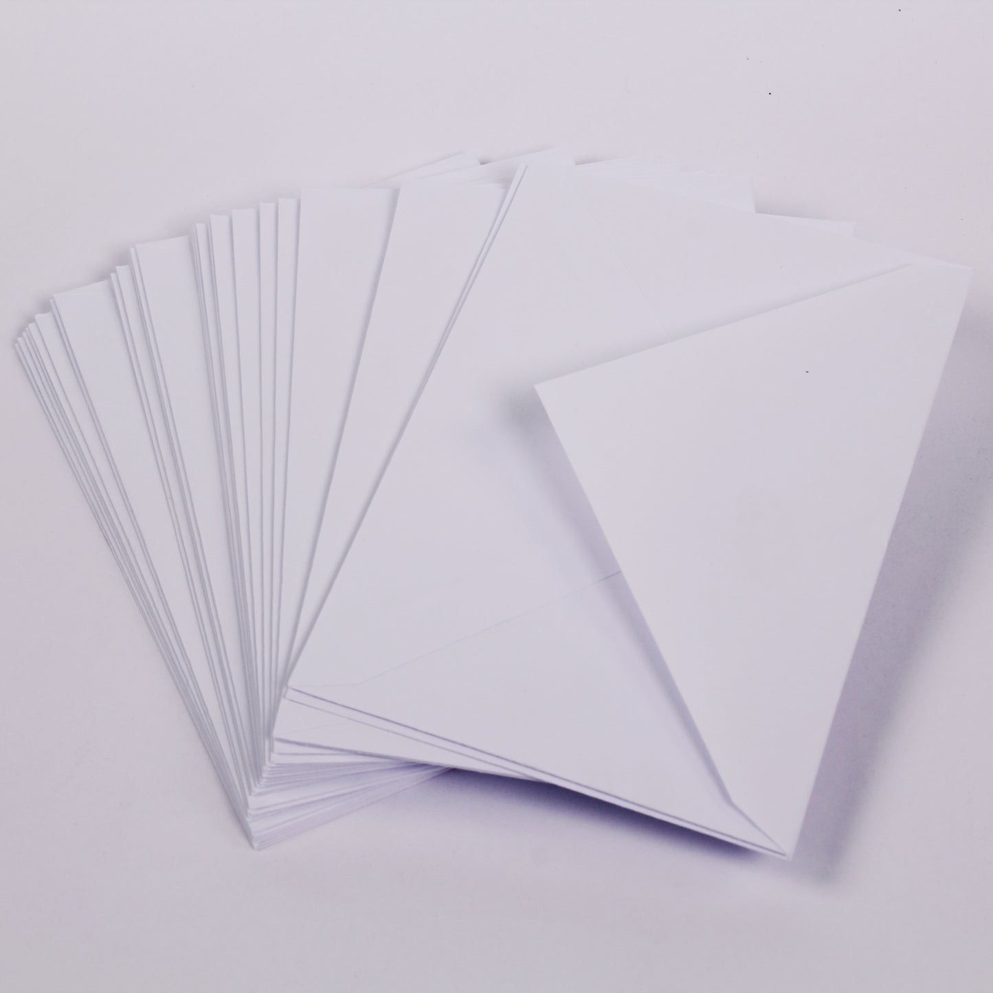 100 white envelopes